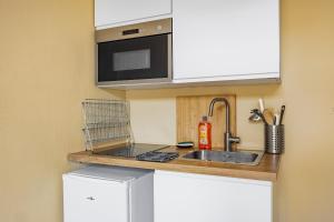 Η κουζίνα ή μικρή κουζίνα στο COMM - Proudhon 7 - SC - Petit cocon confortable à Besançon