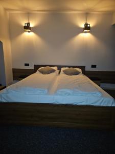 Postel nebo postele na pokoji v ubytování Sewi 2- Kastalia + 10 fotografií