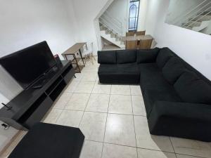 Χώρος καθιστικού στο Casa de 2 andares no caiçara proximo ao Mineirão