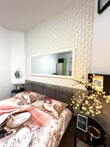 Postel nebo postele na pokoji v ubytování Nilton Apartmans + 9 fotografií