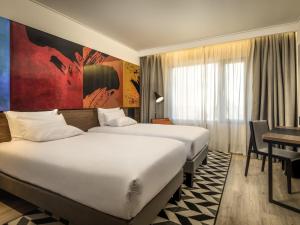 Postel nebo postele na pokoji v ubytování Novotel Santiago Providencia