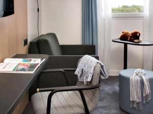 Posezení v ubytování Hôtel ibis Styles Montargis Arboria + 133 fotografií