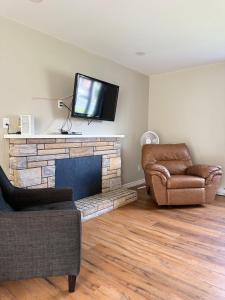 Posezení v ubytování Vinnecomb Apartments - Ground Floor - 3 Bedroom