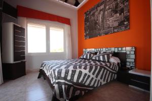 Łóżko lub łóżka w pokoju w obiekcie Villa Chayofa Sunrises