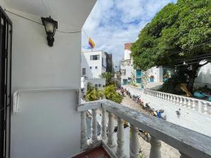 En balkon eller terrasse på Plaza Blanca 2 cabaña en el Santorini Colombiano