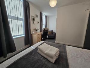 Ένα ή περισσότερα κρεβάτια σε δωμάτιο στο Room 4 Shared House in L7