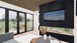 ポールトン・ル・フィルドにあるStaining Luxury Lodgesのリビングルーム(大きなガラス窓付)