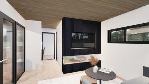 ポールトン・ル・フィルドにあるStaining Luxury Lodgesのリビングルーム(暖炉、テレビ付)