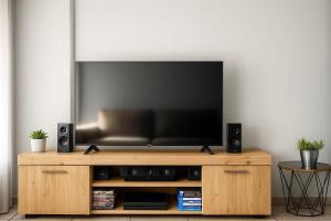 Et tv og/eller underholdning på Luxury Modern Apartment + 7 billeder