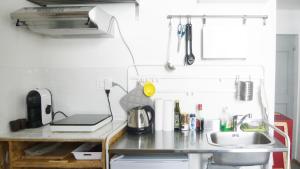 Kuchyň nebo kuchyňský kout v ubytování The Tiny Studio Firenze