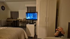 Μια τηλεόραση ή/και κέντρο ψυχαγωγίας στο Dalerheugte Wellness B&B