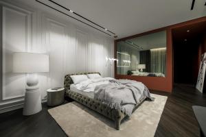 Giường trong phòng chung tại Courtyard Marriot VIP Apartment