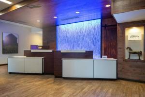 a lobby with a large fountain in a building at Fairfield Inn & Suites by Marriott Savannah Midtown in Savannah +54 photos