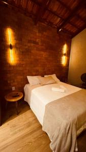 Postel nebo postele na pokoji v ubytování Vila Visgueiro - Loft com spa privativo