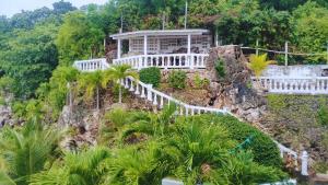 a house on the side of a mountain at The Rock House Eco in San Andrés