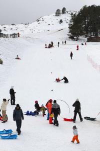 a group of people standing in the snow at Vue exceptionnelle tout en haut des montagnes, dépaysement total ! in Camurac