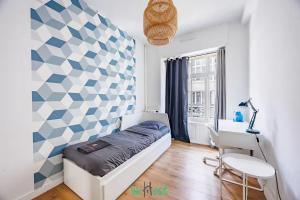 En eller flere senge i et værelse på COMM - Proudhon T5 - SC - Grand T5 lumineux au cœur de Besançon