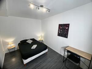 Ένα ή περισσότερα κρεβάτια σε δωμάτιο στο L'Authentique de la Brie