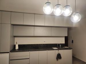 Kuchyň nebo kuchyňský kout v ubytování Mono restaurado