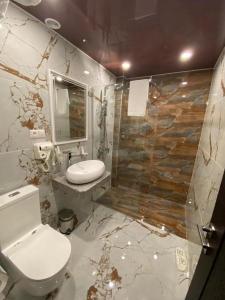 Koupelna v ubytování Viaggio Hotel