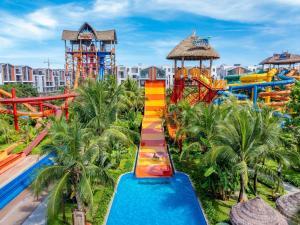 a water park at a resort with a water slide at Hayden Home Ocean Park 3 in Ðình Loan