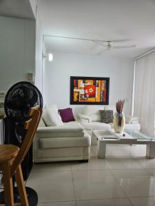 Posezení v ubytování Apartamento Cómodo y Residencial con parqueo