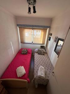 Ένα ή περισσότερα κρεβάτια σε δωμάτιο στο Amanecer en Mardel