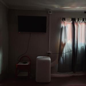 TV a/nebo společenská místnost v ubytování HOSPEDAJE DODERA