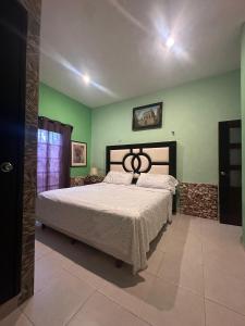 Postel nebo postele na pokoji v ubytování Casa Fernery