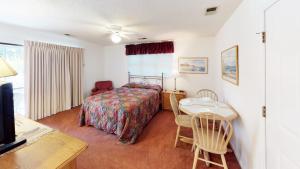 Postel nebo postele na pokoji v ubytování Club Villas Unit 11D