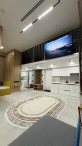 TV a/nebo společenská místnost v ubytování Nest one exclusive apartment