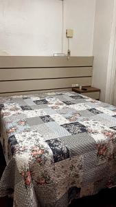 Postel nebo postele na pokoji v ubytování Casa de Família