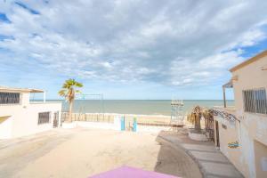 a view of the beach from a building at Condo 5, in San Felipe Just Steps to the Beach, Near the Malecon. in San Felipe
