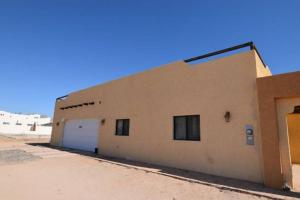 a building in the middle of the desert at Los Sahuaros San Felipe Rental in Don Pancho +16 photos