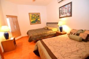 Postel nebo postele na pokoji v ubytování Amazing beach side, Luis Margarita villa