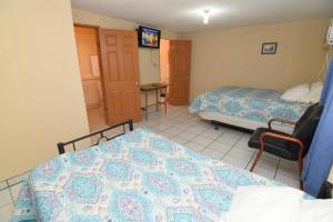 Ένα ή περισσότερα κρεβάτια σε δωμάτιο στο San Felipe Studio 4 FREE WIFI AND CABLE TV