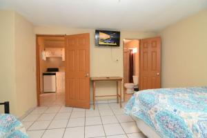 Ένα ή περισσότερα κρεβάτια σε δωμάτιο στο San Felipe Studio 4 FREE WIFI AND CABLE TV