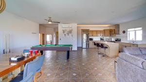 a living room with a ping pong table in it at Amazing El Dorado Ranch Pool house La Kasa 53 in Playa El Paraíso
