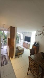 Μια τηλεόραση ή/και κέντρο ψυχαγωγίας στο Quarto para 2 pessoas com ar na Ponta Negra +25 φωτογραφίες