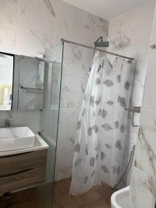 Koupelna v ubytování Beau séjour VIP