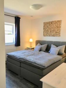 Voodi või voodid majutusasutuse Fewo Baltrumliebe Haus Albers toas