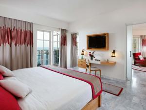 Postel nebo postele na pokoji v ubytování Movenpick Resort & Spa El Gouna