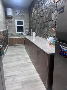 Kuchyň nebo kuchyňský kout v ubytování Shahad Guest House