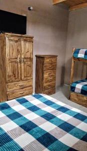 Postel nebo postele na pokoji v ubytování El Shaddai I