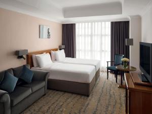Postel nebo postele na pokoji v ubytování Anwar Al Madinah Mövenpick + 158 fotografií