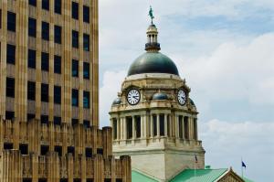 a building with a clock tower on top of it at The Amaya - 21 and older only in Fort Wayne