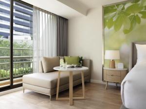 Χώρος καθιστικού στο Mövenpick BDMS Wellness Resort Bangkok
