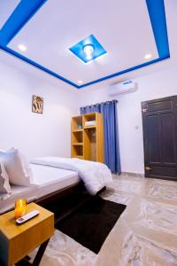 Ένα ή περισσότερα κρεβάτια σε δωμάτιο στο Bkap Apparts - Site 02