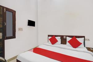 Postel nebo postele na pokoji v ubytování Hotel O Prince