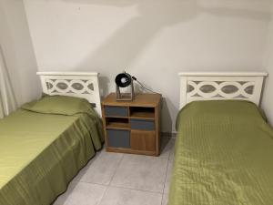 Ένα ή περισσότερα κρεβάτια σε δωμάτιο στο mirante del cerro +19 φωτογραφίες